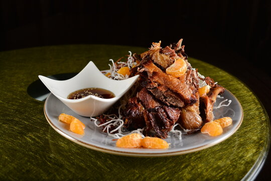 Asian Premium Banquet Menu Bbq Duck Confit Meat With Mandarin Orange Sauce On Gold Background Dining Table