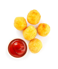 Fried potato balls with tomato sauce on white background