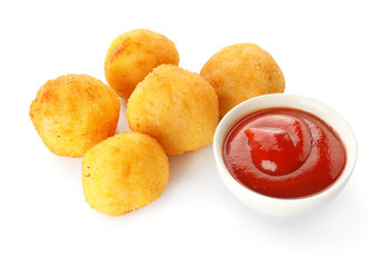 Fried potato balls with tomato sauce on white background