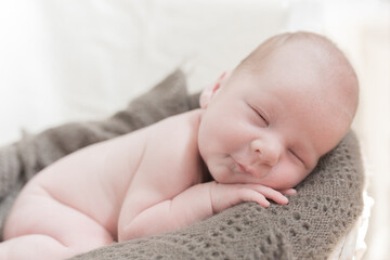 Portrait of a newborn naked baby