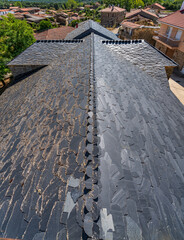 Slate roof with difference between north and south sides