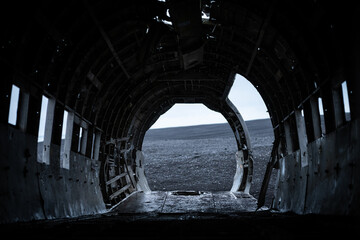 Interior of crashed aircraft at Solheimasandur in Iceland on a sad dark rainy day