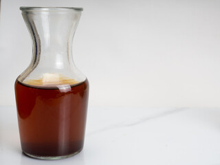 A cup of iced coffee on a wooden table
