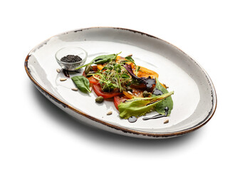Plate with tasty tomato carpaccio on white background