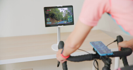 woman ride exercise bike