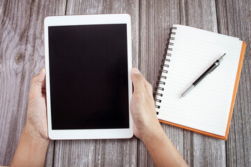 Closeup mockup of hand man touch screen on digital tablet, marketing technology and business...