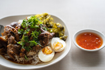 Stewed pork leg on steamed rice.