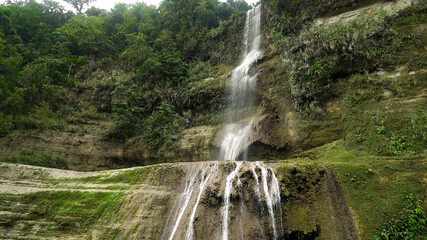 Can umantad Falls in the tropical jungle, Bohol, Philippines. Waterfall in the tropical forest.