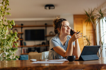 Adult woman, having a conversation with her mother.