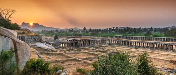 View of sunrise at Pushkarni, Sri Krishna tank in ruins. Hampi, karnataka, India.