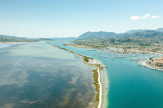Aerial view of an asphalt road in the middle of the sea