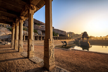 View of sunrise at Pushkarni, Sri Krishna tank in ruins. Hampi, karnataka, India.