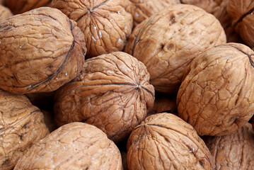Fototapeta na wymiar close-up background of organic walnuts