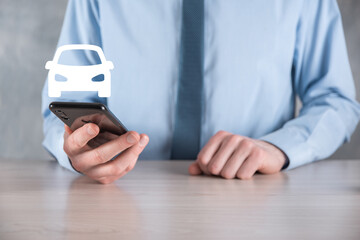 Digital composite of Man holding car icon.Car automobile insurance and car services concept. Businessman with offering gesture and icon of car.