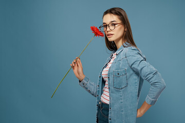 woman wearing glasses red flower near face fashion studio