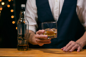 Barman pouring whiskey whiskey glass beautiful night