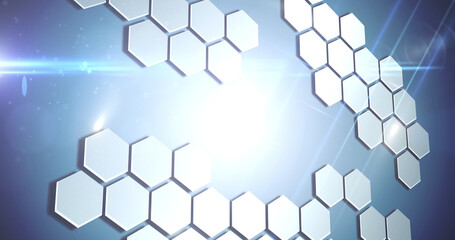 Image of network of hexagons over glowing background