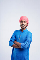 Young indian farmer giving expression on white background.