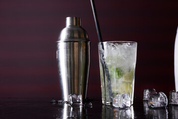 Cocktail on black background. Cocktail at the bar. Alcoholic drink at the night club