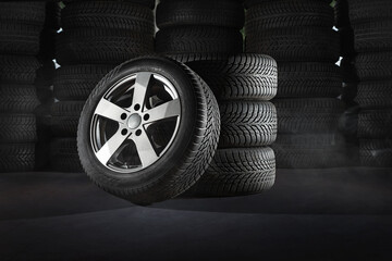 Car tires with a great profile in the car repair shop - obrazy, fototapety, plakaty