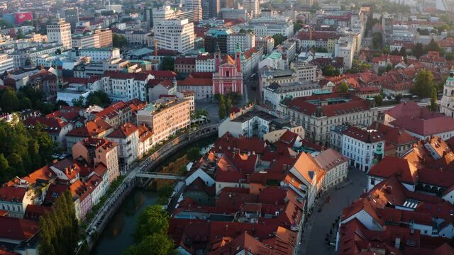 Beautiful Mix Of Old And New Architecture In Ljubljana Town In Slovenia In Sunrise - panning aerial shot