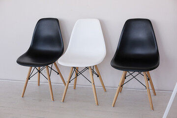 Office interior work space. white and black chairs before briefing