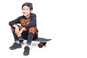 boy sitting on surf skating black white background and isolated