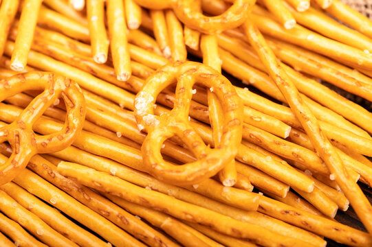 Bread sticks and bread figures with salt. Close-up Background image.
