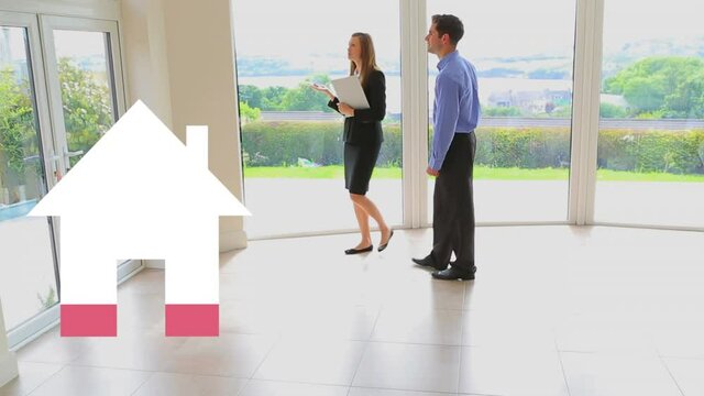 Animation of house icon filling pink, over female estate agent showing man house