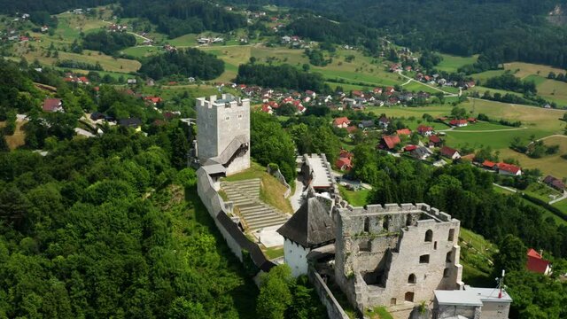 Aerial View Of Ancient Celje Castle Ruins On Top Of Green Hills In Celje, Slovenia.