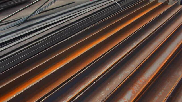 Beautiful orange and brown rusted metal strips in slow mo.