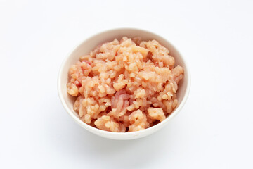 Fototapeta na wymiar Minced meat of chicken fillet in white bowl on white background.
