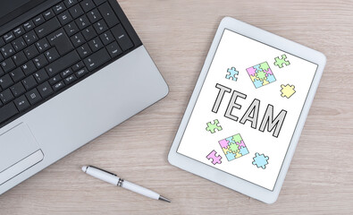 Team concept on a digital tablet