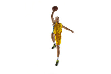 Full length portrait of a basketball player with a ball isolated on white studio background. Advertising concept. Fit Caucasian athlete jumping with ball.