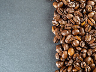 Coffee beans are not black textured background.