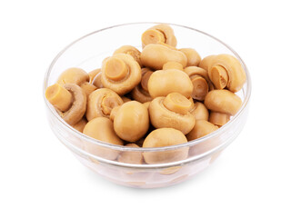 Pile of fresh shiitake mushrooms on wooden plate isolated on white background. Raw shitake, healthy organic asian fungi side view