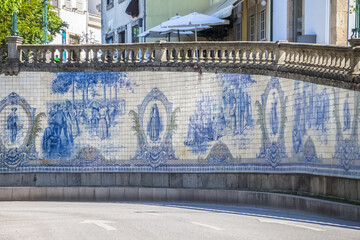 General view of the iconic tile panel, designed and painted by Joaquim Lopes in 1931, located in Praça da República or Praça do Rossio in Viseu. - obrazy, fototapety, plakaty