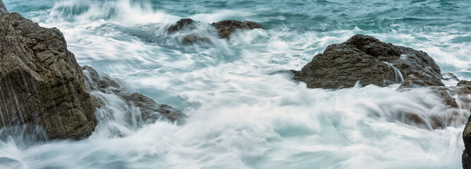 water flowing into the rocks
