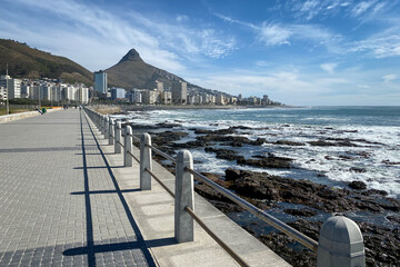 Sea Point Promenade with scenic view Seapoint district and Lion’s Head Peak, Cape Town, South Africa. © A. Emson