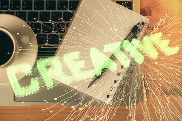 Double exposure of creative drawing and work table top veiw. Concept of startup.