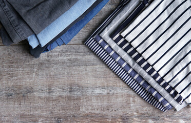 clothing denim fabric and striped T-shirt on the table