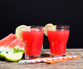 watermelon juice from watermelons and pieces of lime or lemo