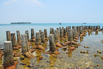 Wave breaker blocks by the sea at Jakarta bay