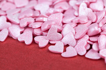 Obraz na płótnie Canvas heart shaped pink sweet candy