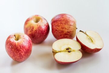 Apples on a grey background. Concept of healthy nutrition and vitamins. Flat lay with copy space. Horizontal orientation
