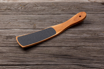 Wooden pedicure grater on boards