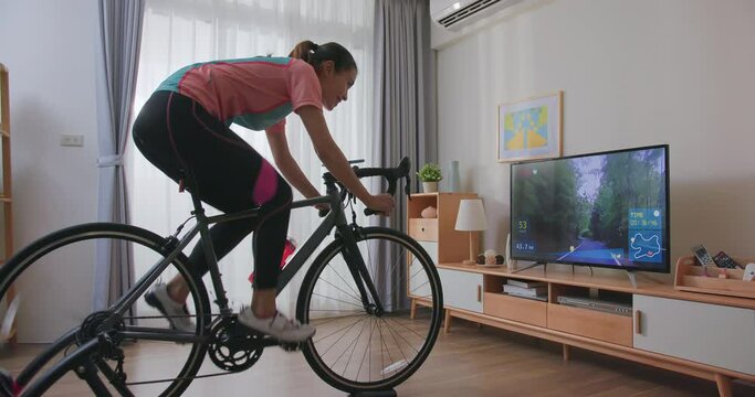 woman ride exercise bike