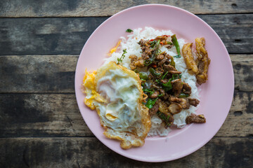 Top view Stir fried beef with chili and fried egg
