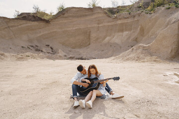 Young couple in love in sand career