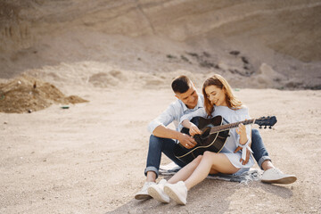 Young couple in love in sand career